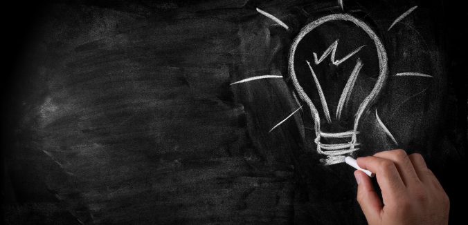 doodle-hand-lightbulb-on-chalkboard_wide