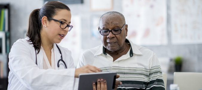 Doctor With A Tablet Computer